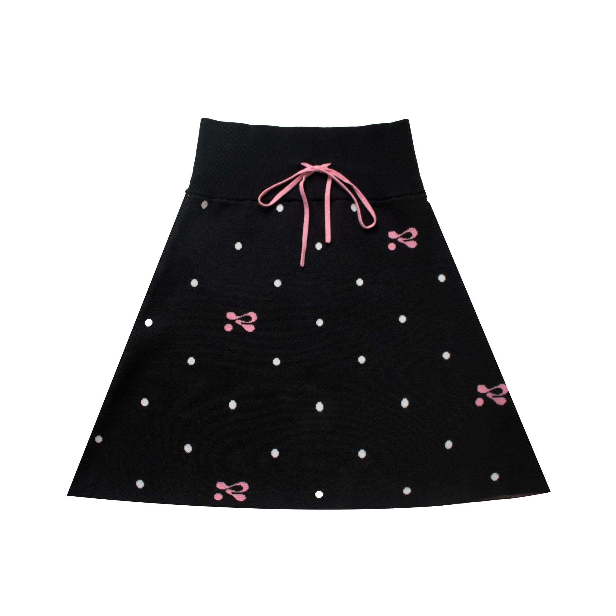 Black skirt with white polka dots and pink bows on a white background